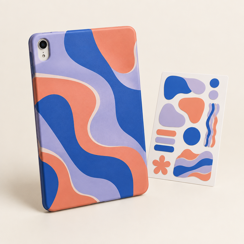 Colorful abstract custom iPad case beside matching decorative stickers