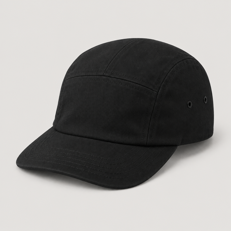 Plain black five-panel cap shown from a front three-quarter angle